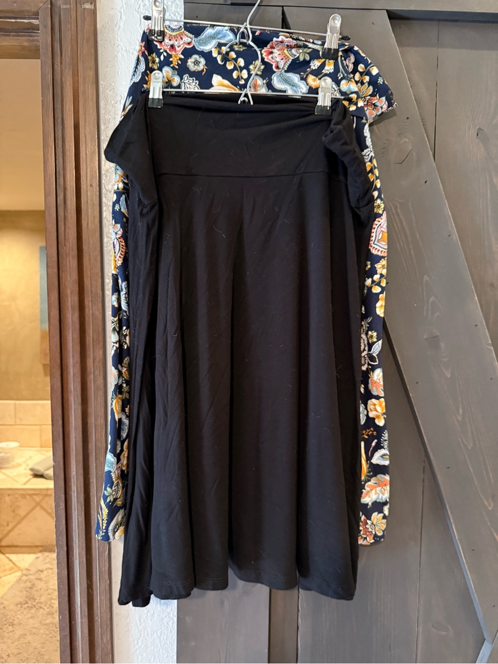 Bundle of two skirts one black one floral